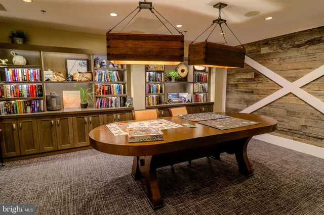 a close view of a fireplace with a clock on top