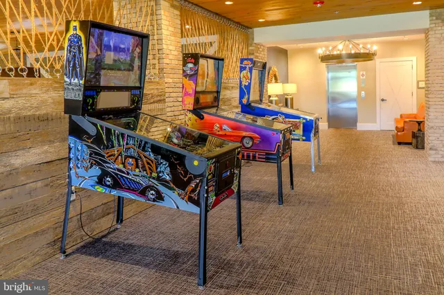 a dining room with furniture and a window
