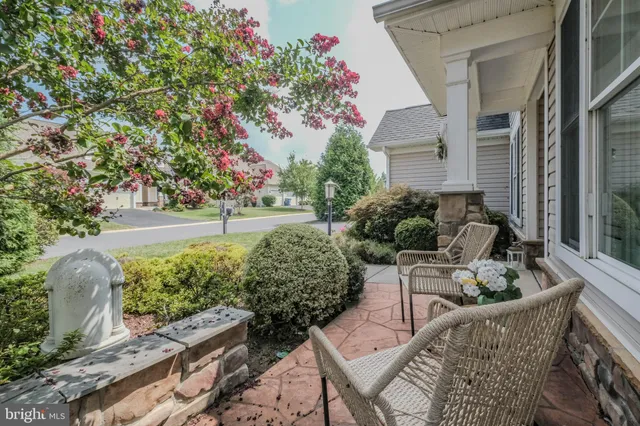 a bedroom with a bed and a television