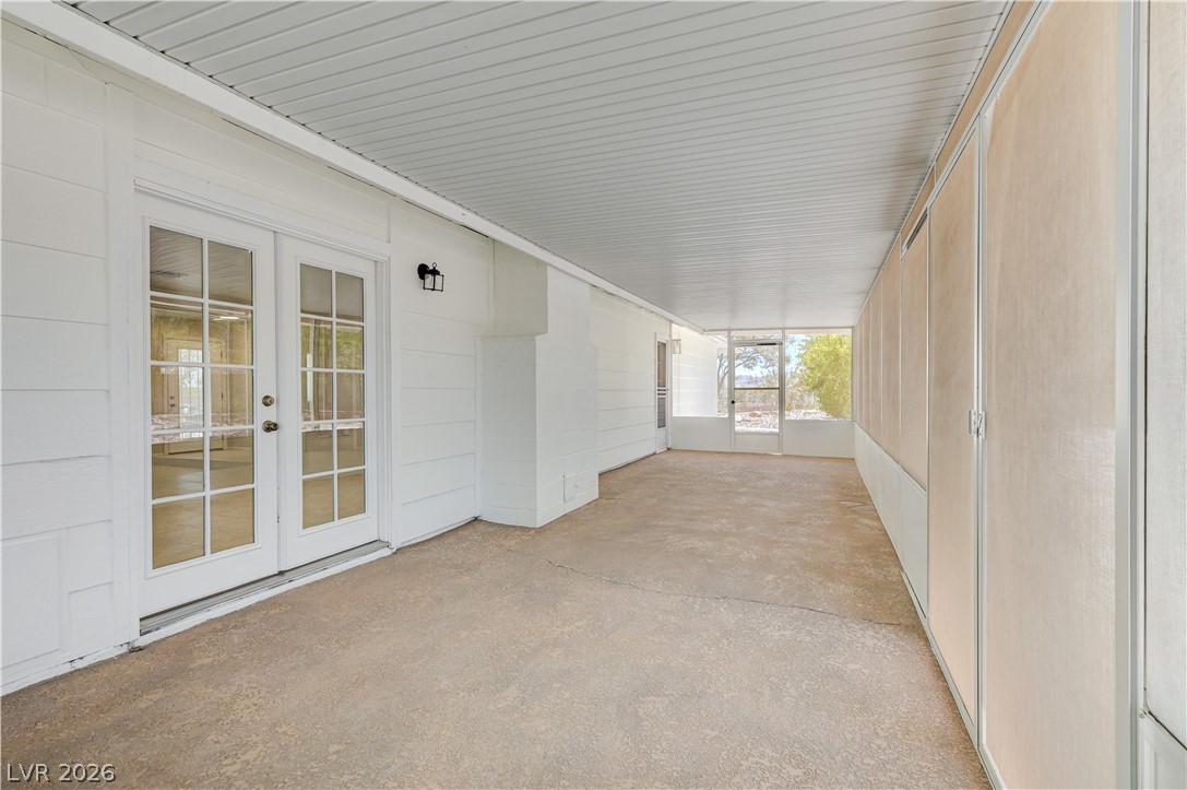 7631 Bermuda Road Las Vegas, NV 89123 - Photo 33 of 64 A spacious covered patio invites comfortable outdoor living with ample room for entertaining.