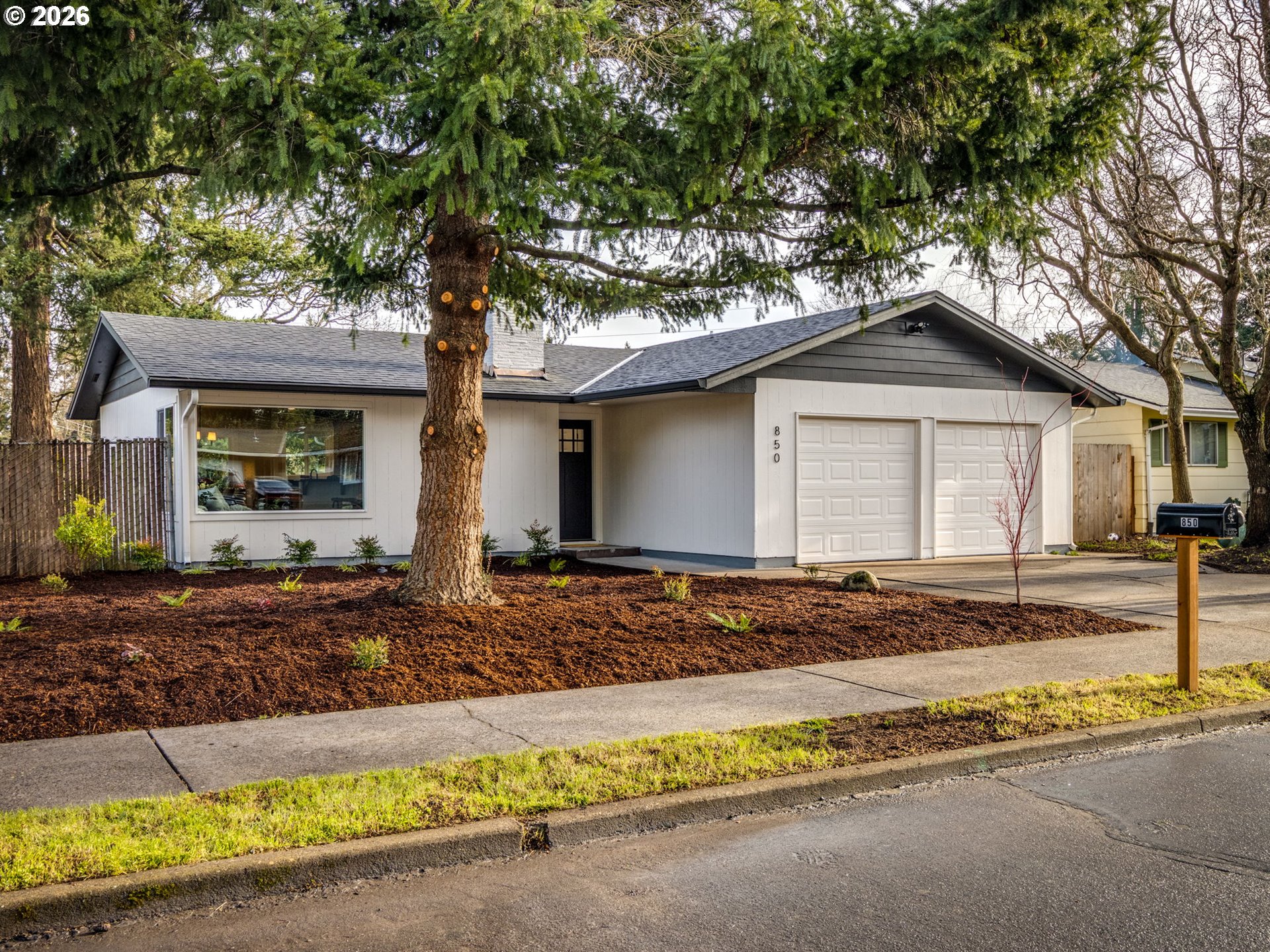 850 Northeast 179th Avenue Portland, OR 97230 - Photo 2 of 30 a front view of a house with a yard