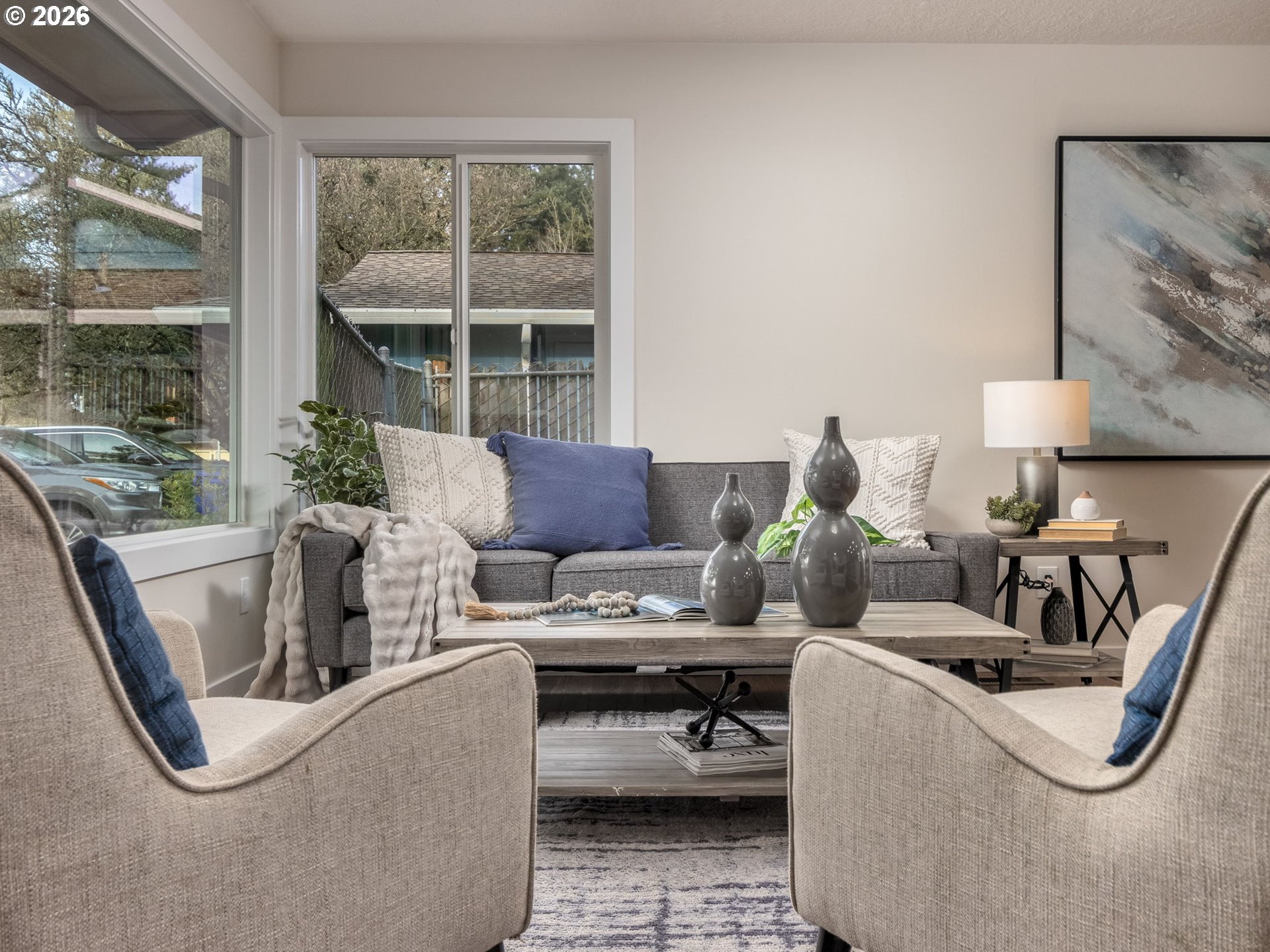 850 Northeast 179th Avenue Portland, OR 97230 - Photo 7 of 30 a living room with furniture and a floor to ceiling window