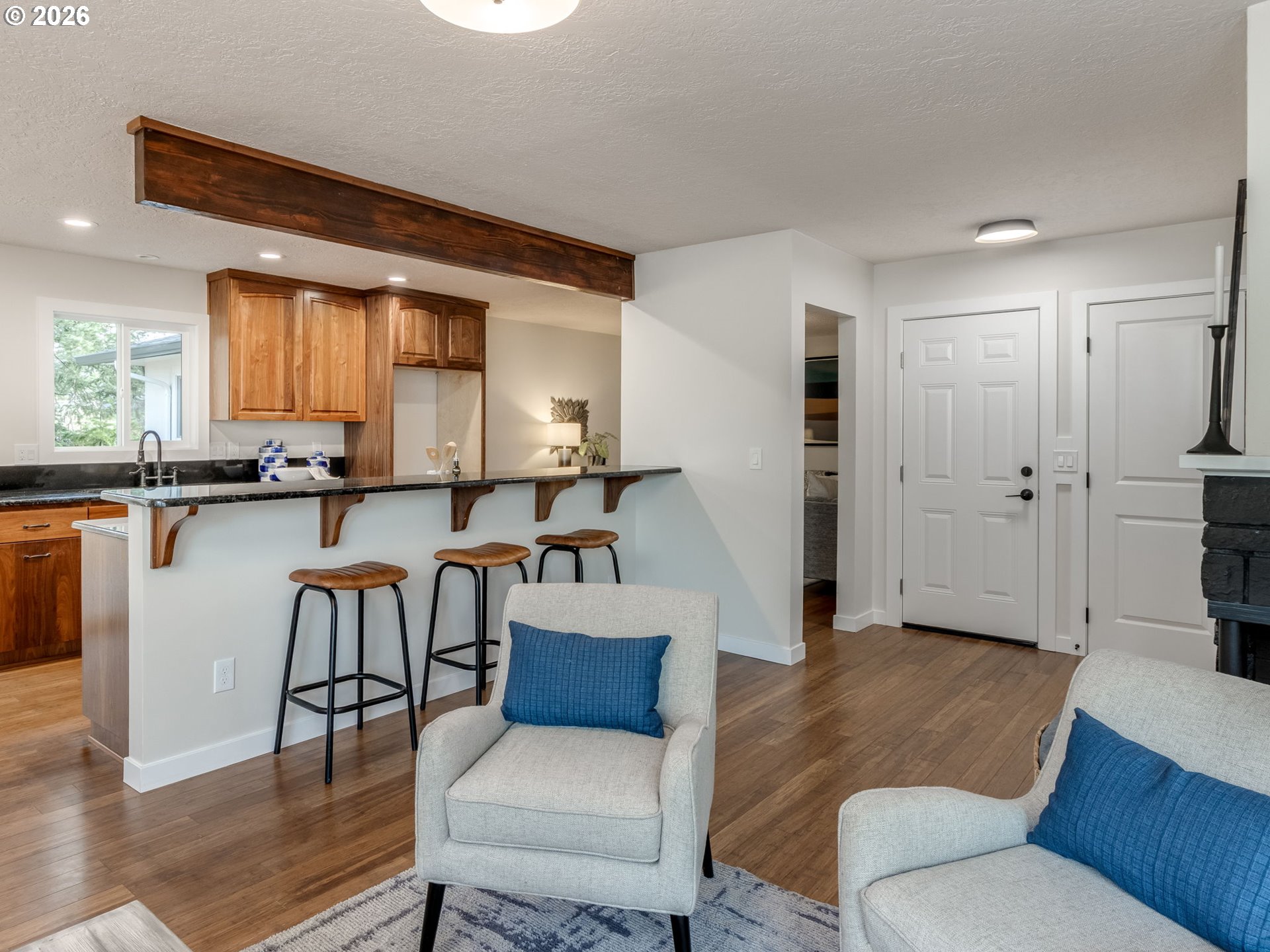 850 Northeast 179th Avenue Portland, OR 97230 - Photo 10 of 30 a living room with furniture and a wooden floor