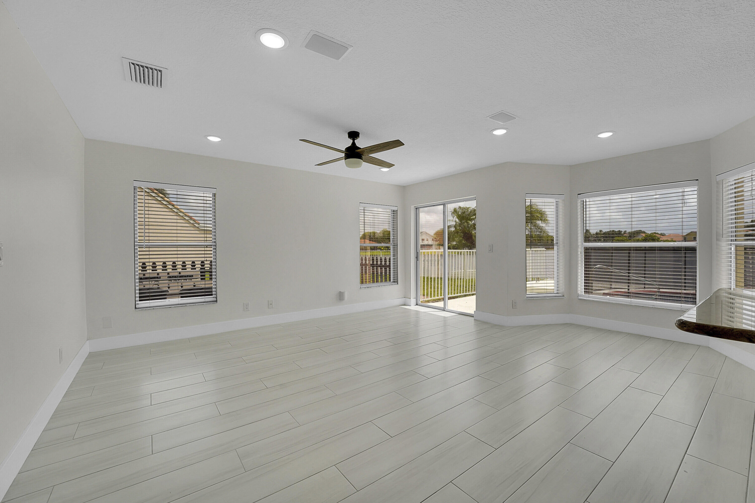7282 Michigan Isle Road Lake Worth, FL 33467 - Photo 11 of 43 12_family room