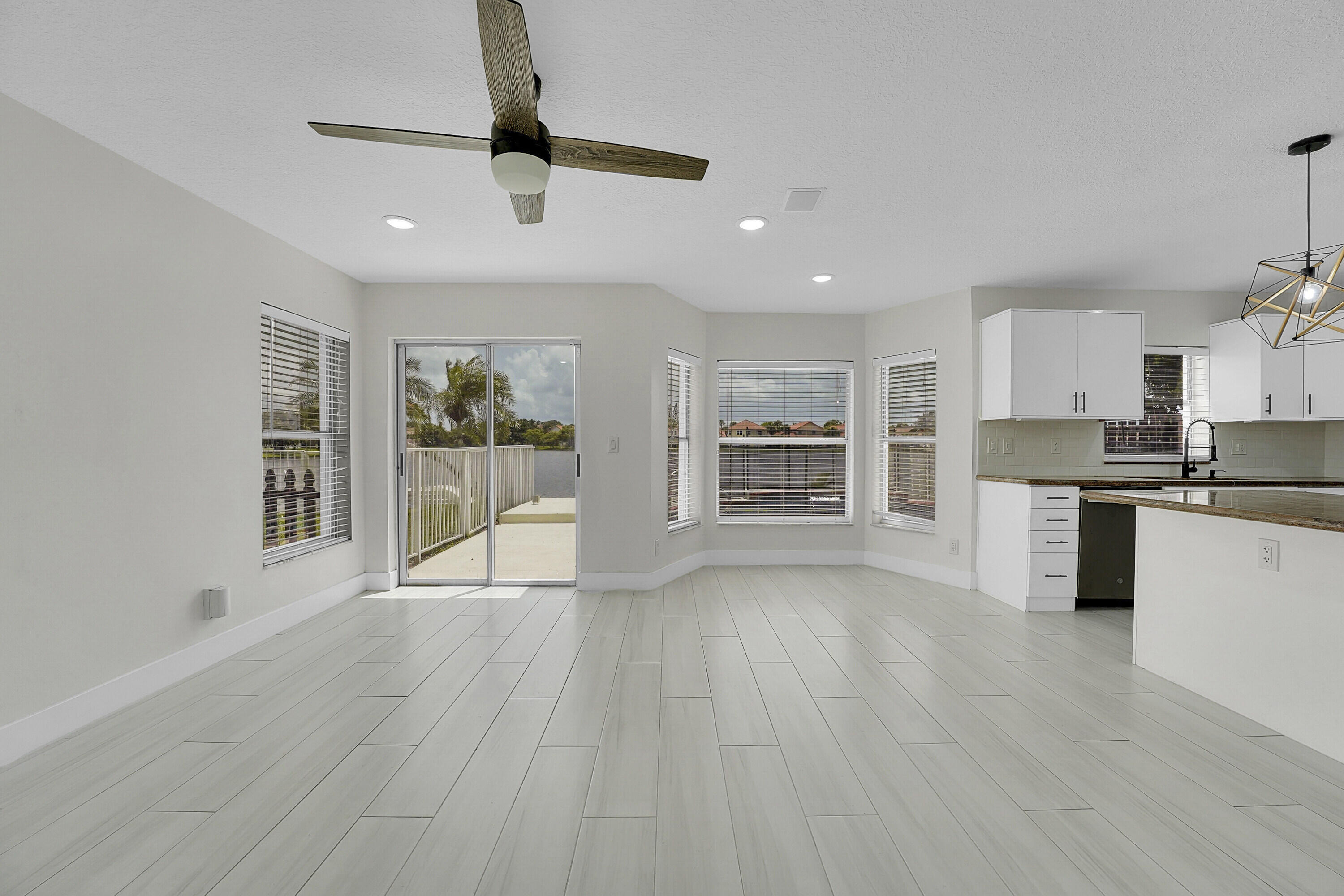 7282 Michigan Isle Road Lake Worth, FL 33467 - Photo 12 of 43 13_family room
