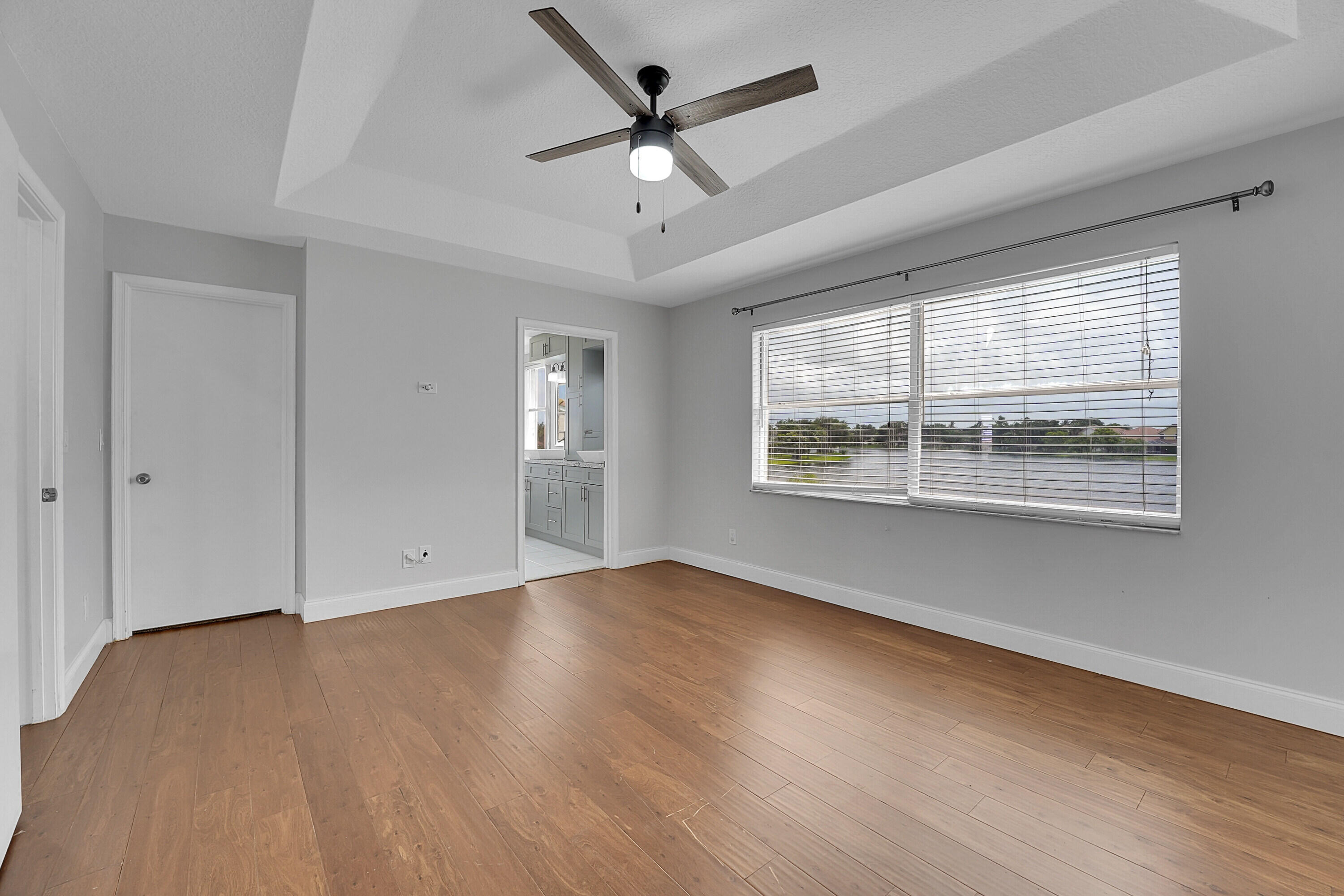 7282 Michigan Isle Road Lake Worth, FL 33467 - Photo 23 of 43 24_primary bedroom