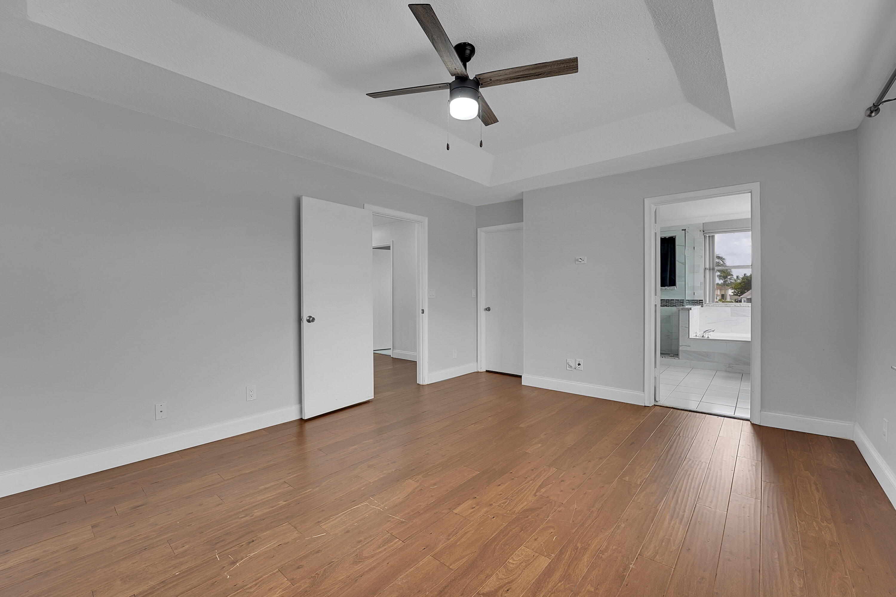 7282 Michigan Isle Road Lake Worth, FL 33467 - Photo 24 of 43 25_primary bedroom
