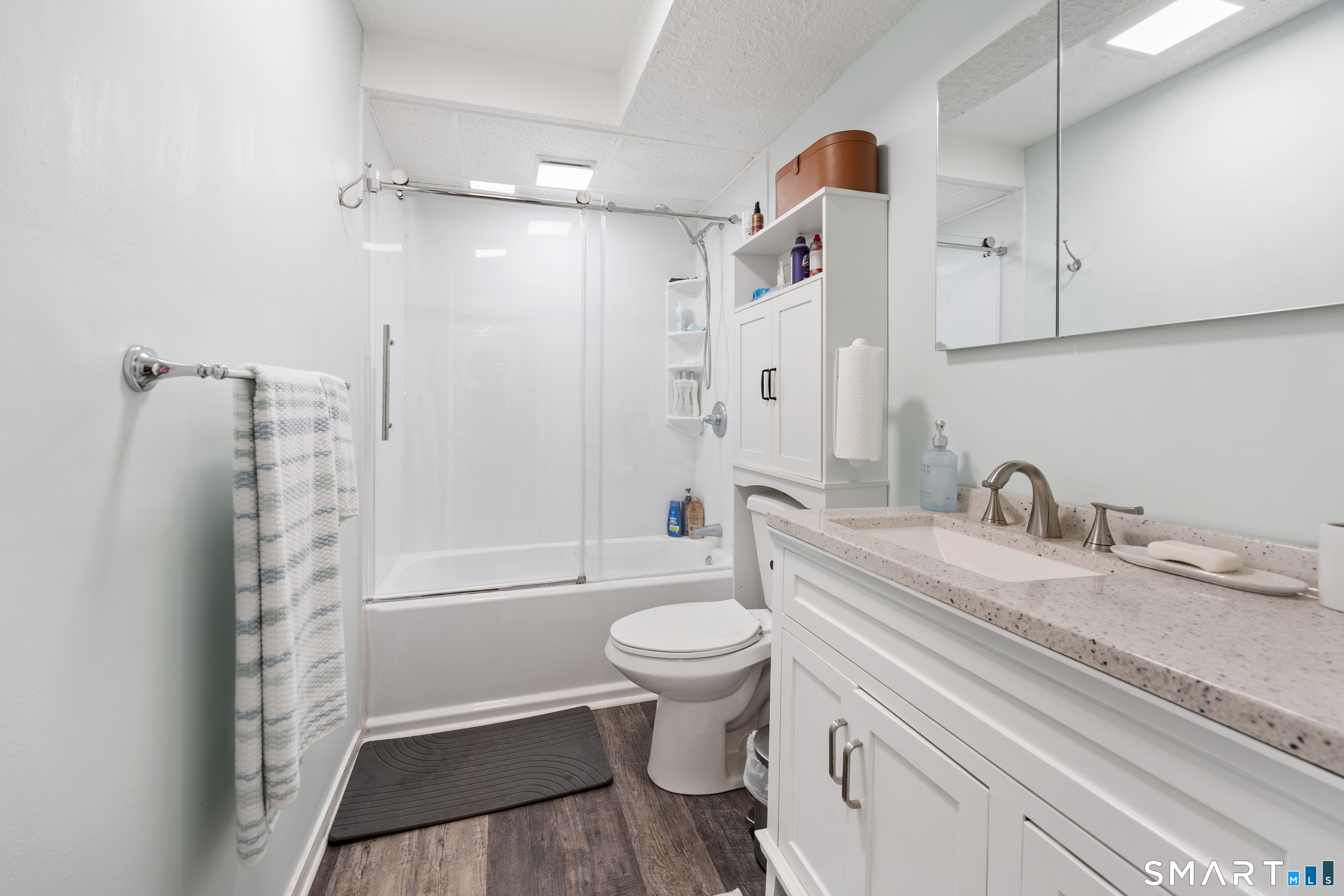 560 Yale Avenue, Unit 82 Meriden, CT 06450 - Photo 14 of 22 a bathroom with a sink a toilet and a shower
