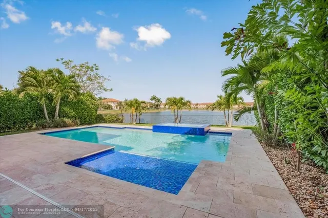 $1,399,999 | 9800 South Miralago Way, Parkland, FL 33076