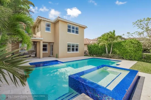 $1,399,999 | 9800 South Miralago Way, Parkland, FL 33076