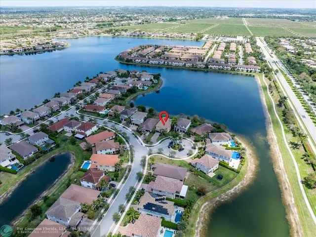 $1,399,999 | 9800 South Miralago Way, Parkland, FL 33076