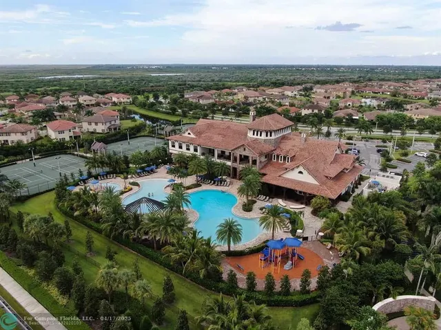 $1,399,999 | 9800 South Miralago Way, Parkland, FL 33076