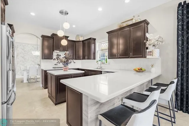 $1,399,999 | 9800 South Miralago Way, Parkland, FL 33076