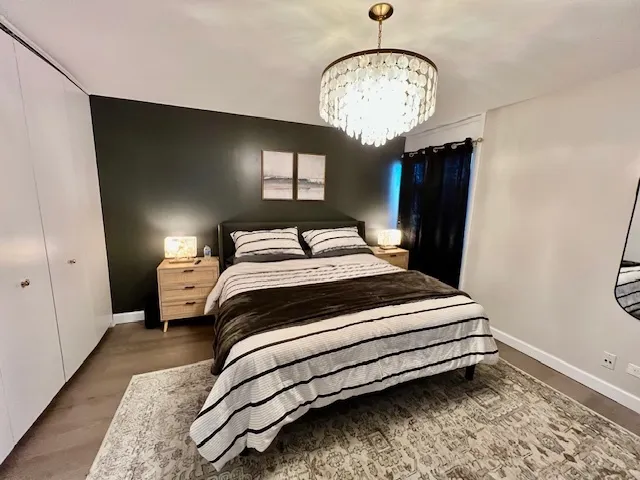 a kitchen with a sink a stove and a refrigerator