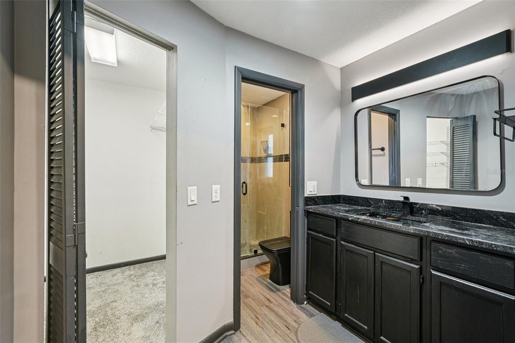 2015 Ronald Circle Seffner, FL 33584 - Photo 13 of 27 a bathroom with double vanity and a mirror