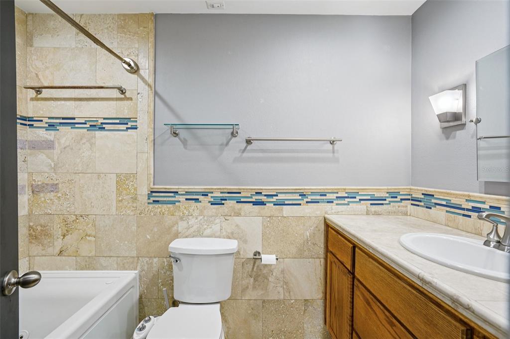 2015 Ronald Circle Seffner, FL 33584 - Photo 17 of 27 a bathroom with a sink a toilet and shower