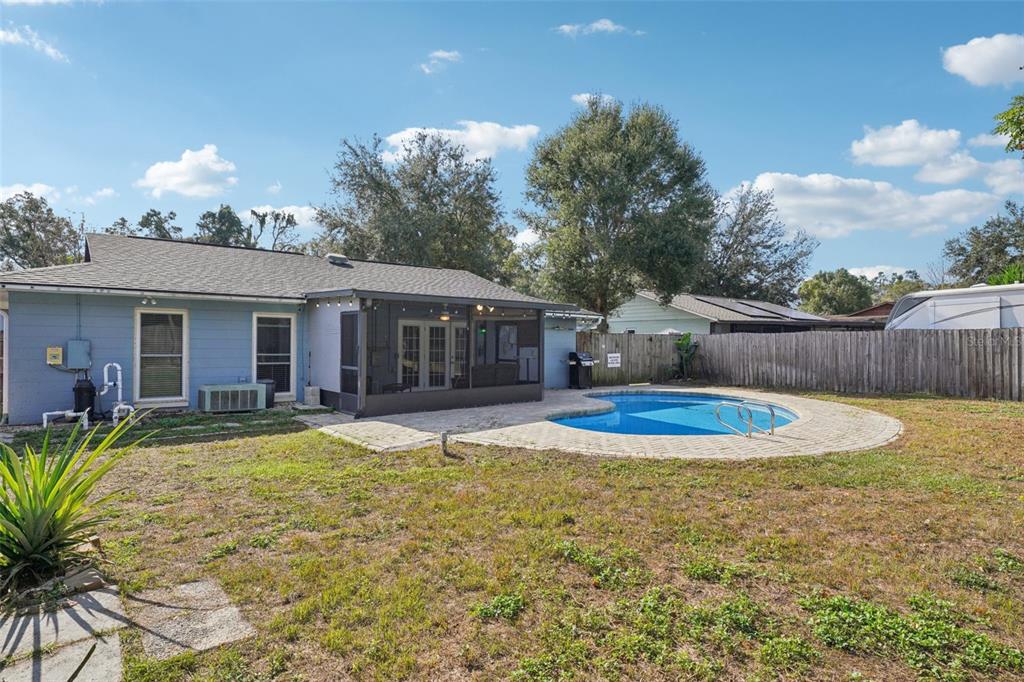 2015 Ronald Circle Seffner, FL 33584 - Photo 23 of 27 a view of a house with swimming pool and sitting area