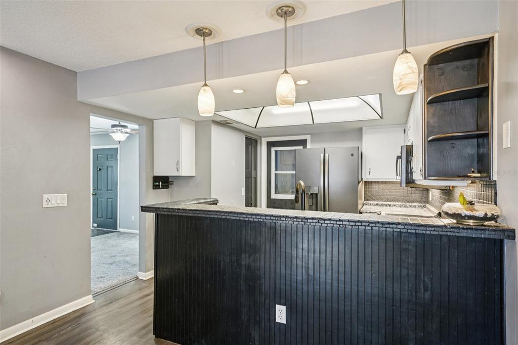 2015 Ronald Circle Seffner, FL 33584 - Photo 7 of 27 a kitchen with stainless steel appliances granite countertop counter space a sink and cabinets