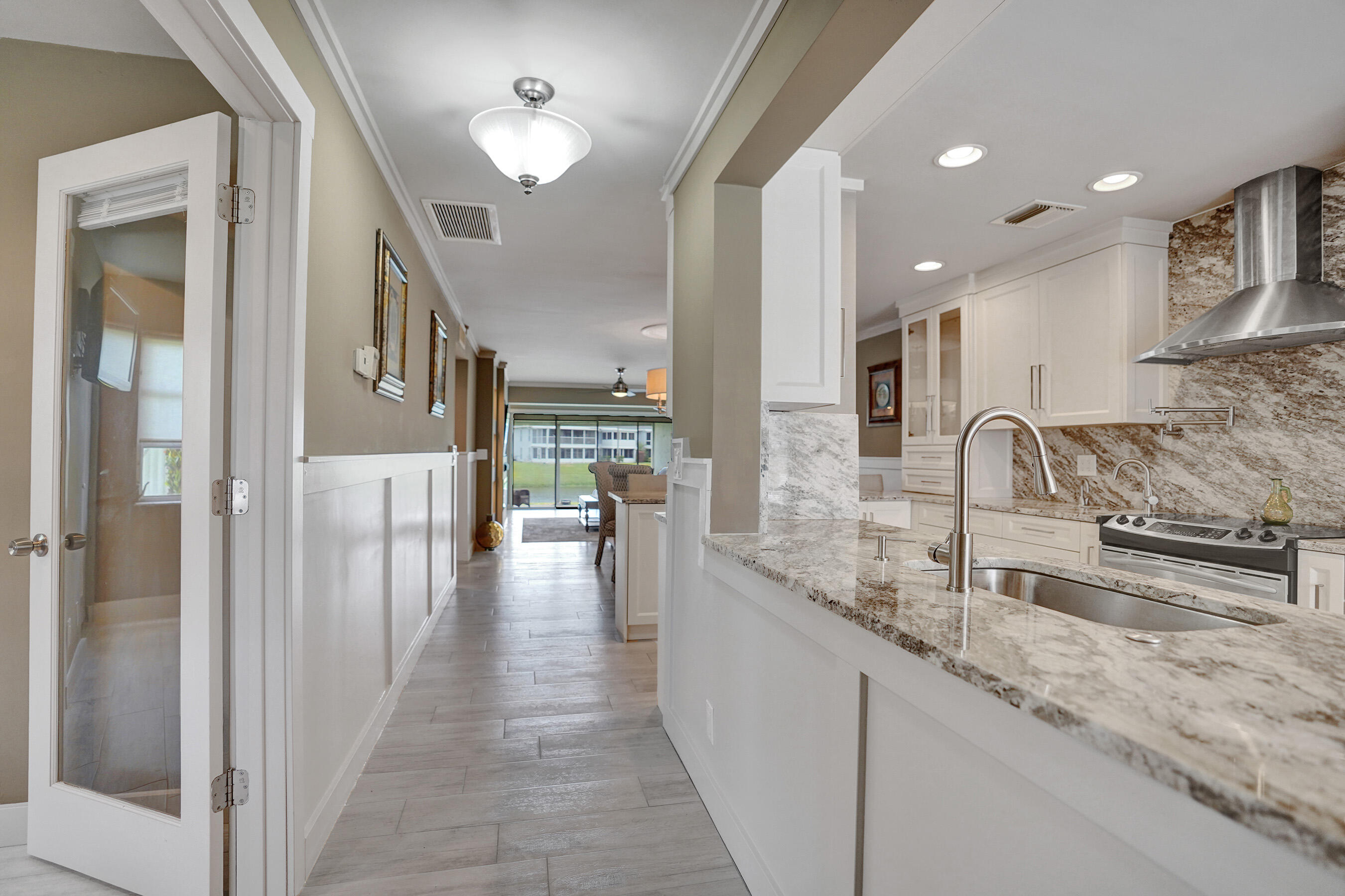 2820 Southwest 13th Street, Unit 101 Delray Beach, FL 33445 - Photo 7 of 83 Entrance hallwy