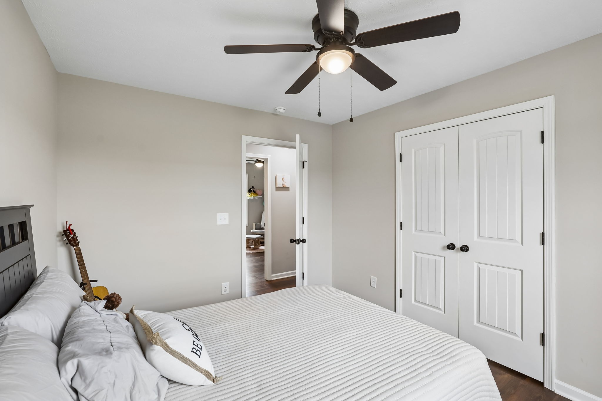 1715 Old Belfast Road Lewisburg, TN 37091 - Photo 33 of 42 a bedroom with a bed and a chandelier