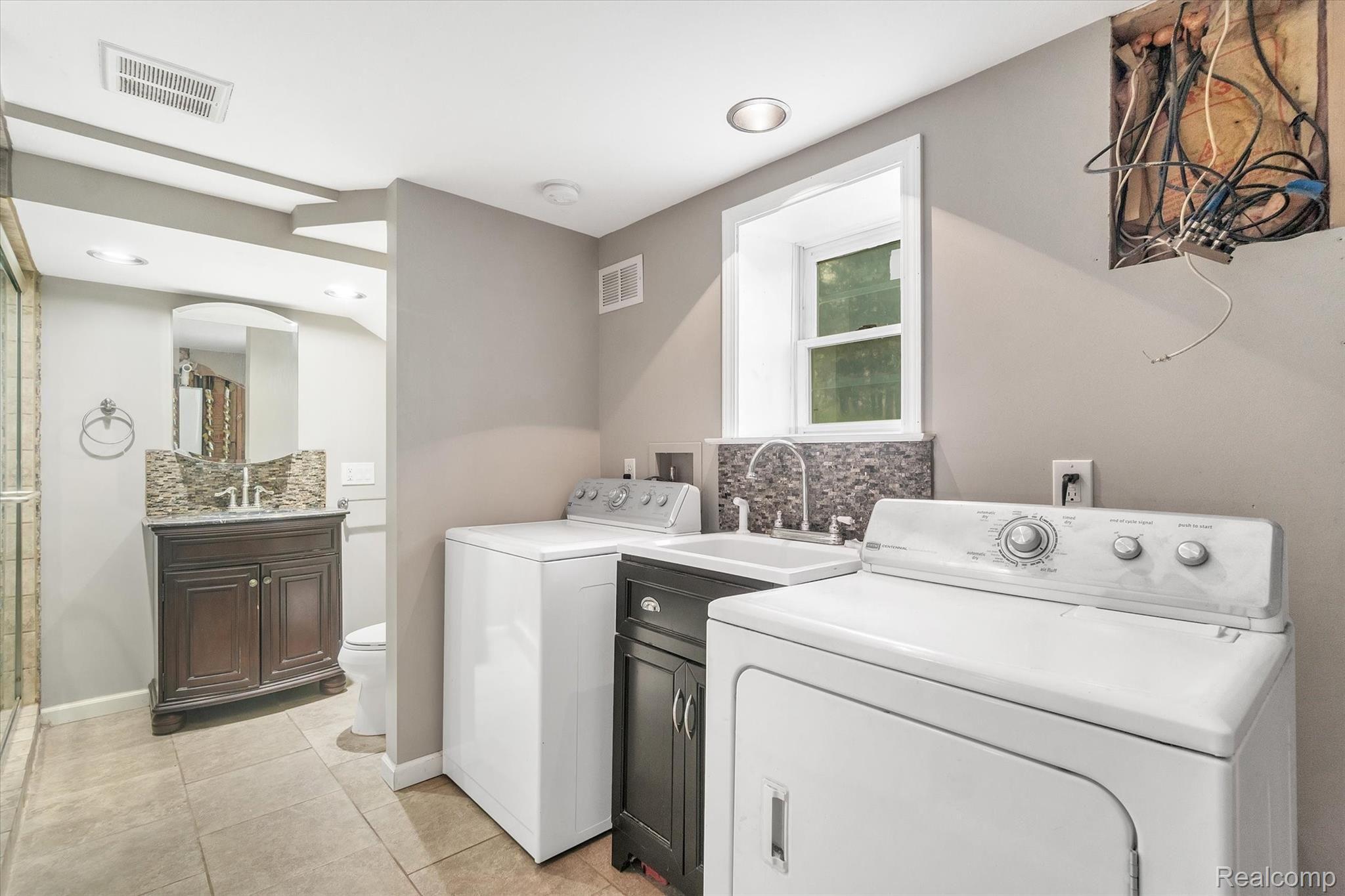 165 Harmon Road Howell, MI 48843 - Photo 22 of 39 Laundry Room In Lower-Level