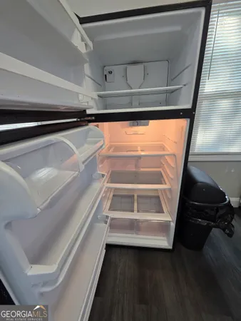 a view of walk in closet with window