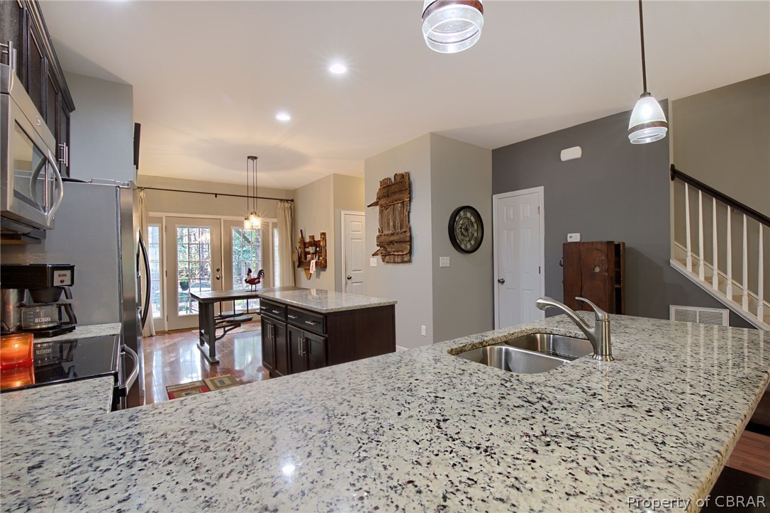 8755 Indian Road Gloucester, VA 23061 - Photo 11 of 41 Pendant lighting & separate pantry