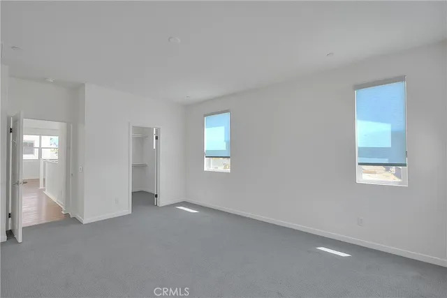 a white bath tub sitting next to a window