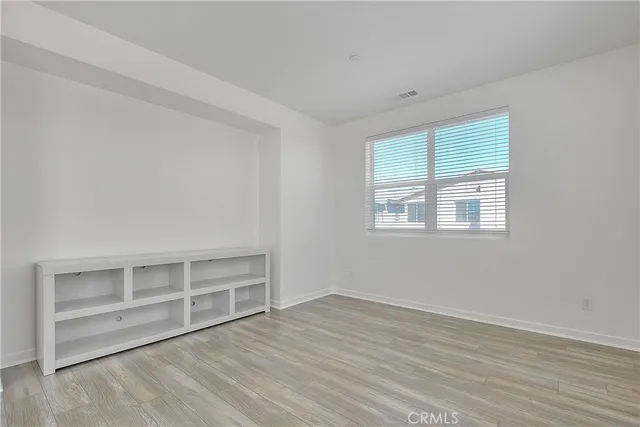 a dining room with furniture and outdoor view