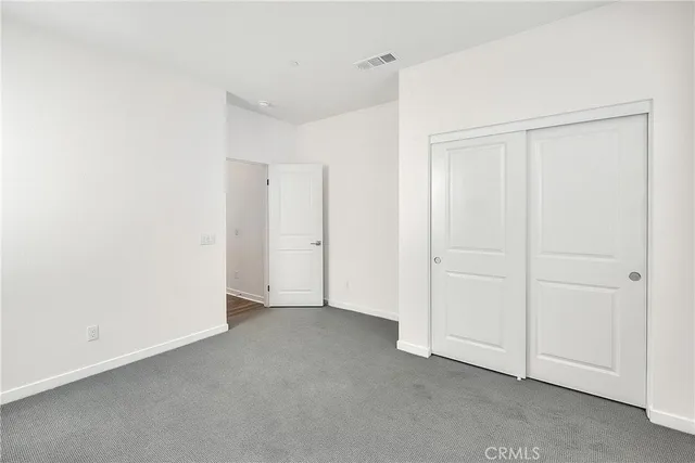 a view of a swimming pool with an outdoor seating and deck