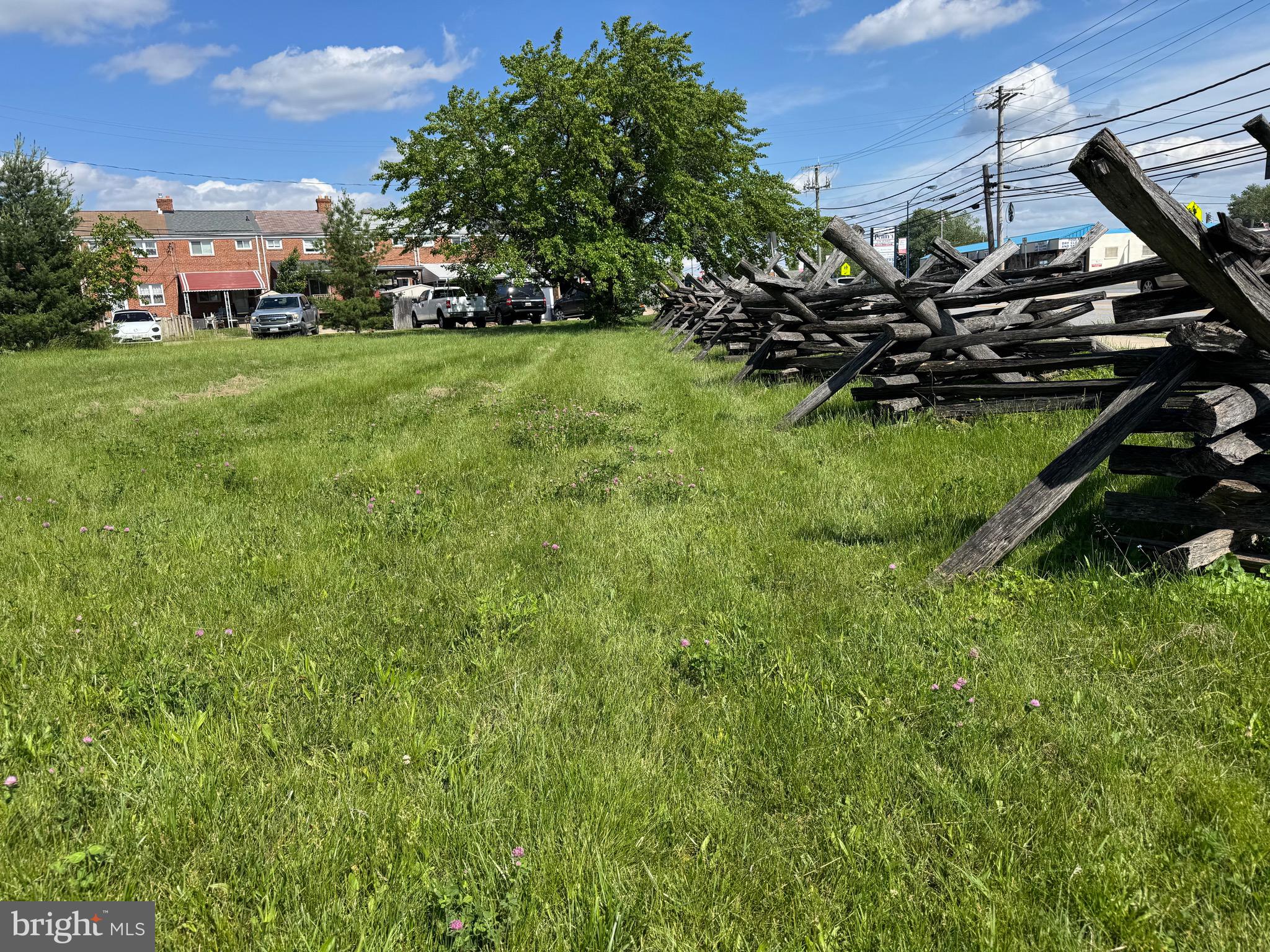 8024 Kimberly Road Dundalk, MD 21222 - Photo 13 of 16 a view of a lush green field
