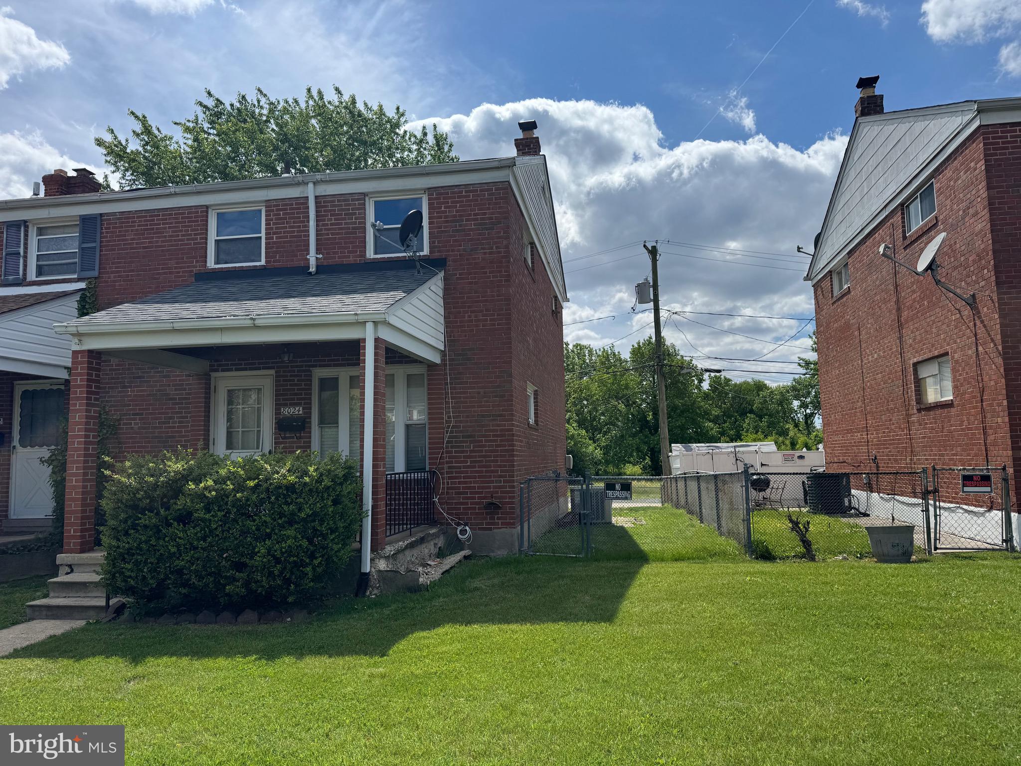 8024 Kimberly Road Dundalk, MD 21222 - Photo 16 of 16 a view of a house with a yard and plants