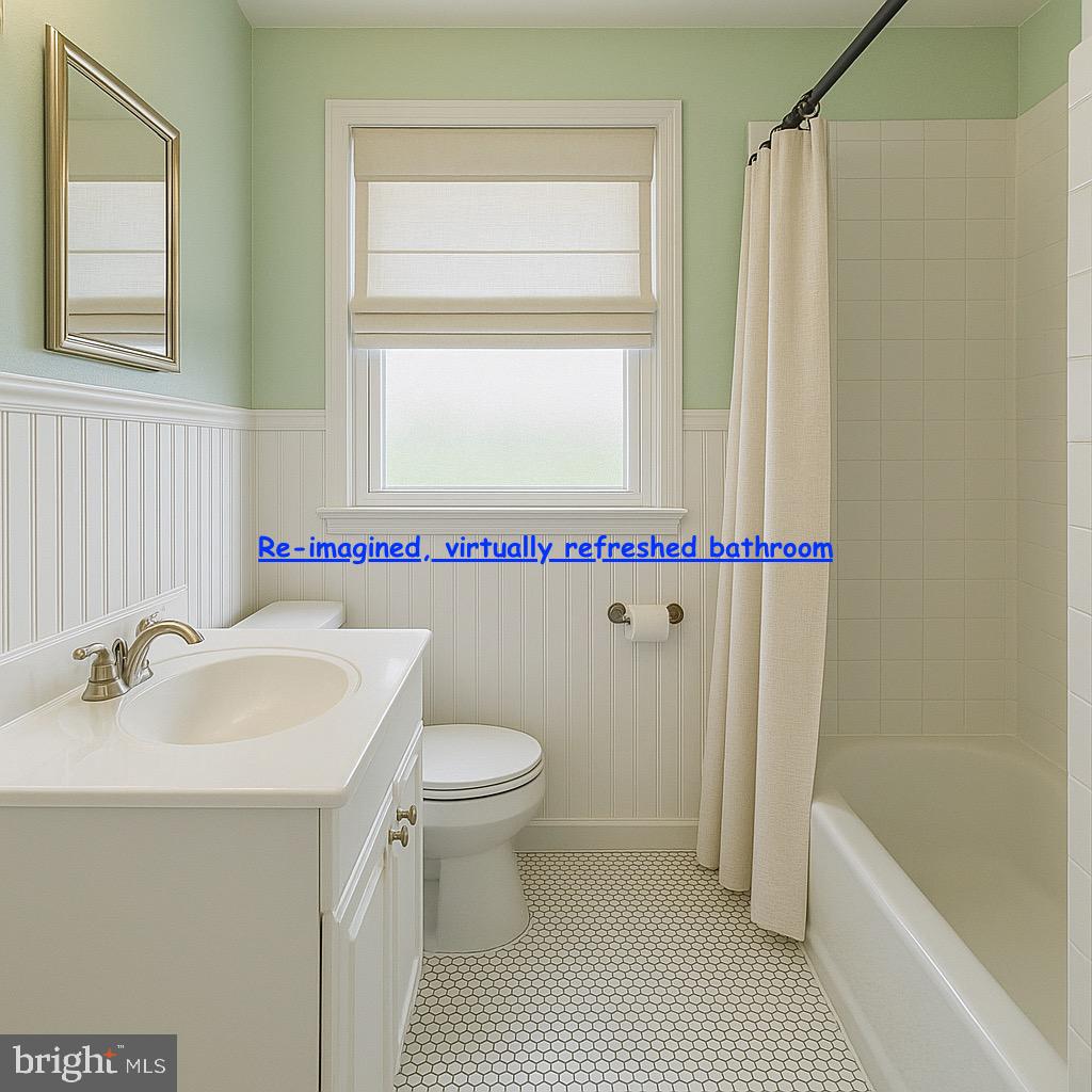 8024 Kimberly Road Dundalk, MD 21222 - Photo 6 of 16 a bathroom with a sink and a mirror