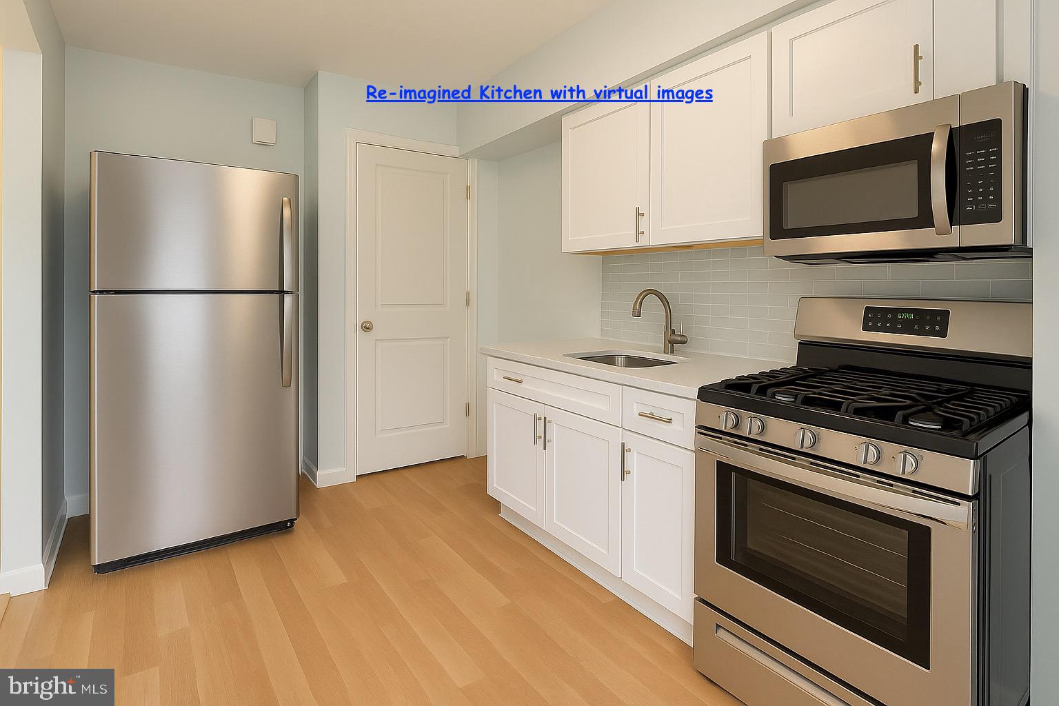 8024 Kimberly Road Dundalk, MD 21222 - Photo 10 of 16 a kitchen with stainless steel appliances a stove microwave and a refrigerator