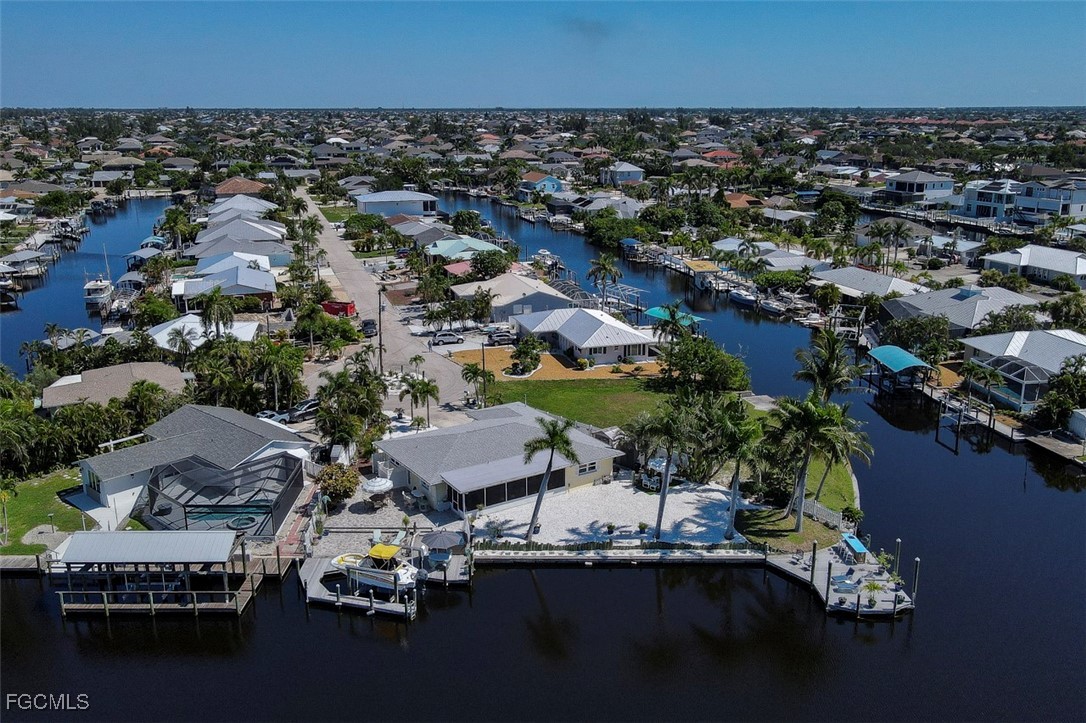 12082 Moon Shell Drive Matlacha Isles, FL 33991 - Photo 38 of 46 an aerial view of a house with a lake view