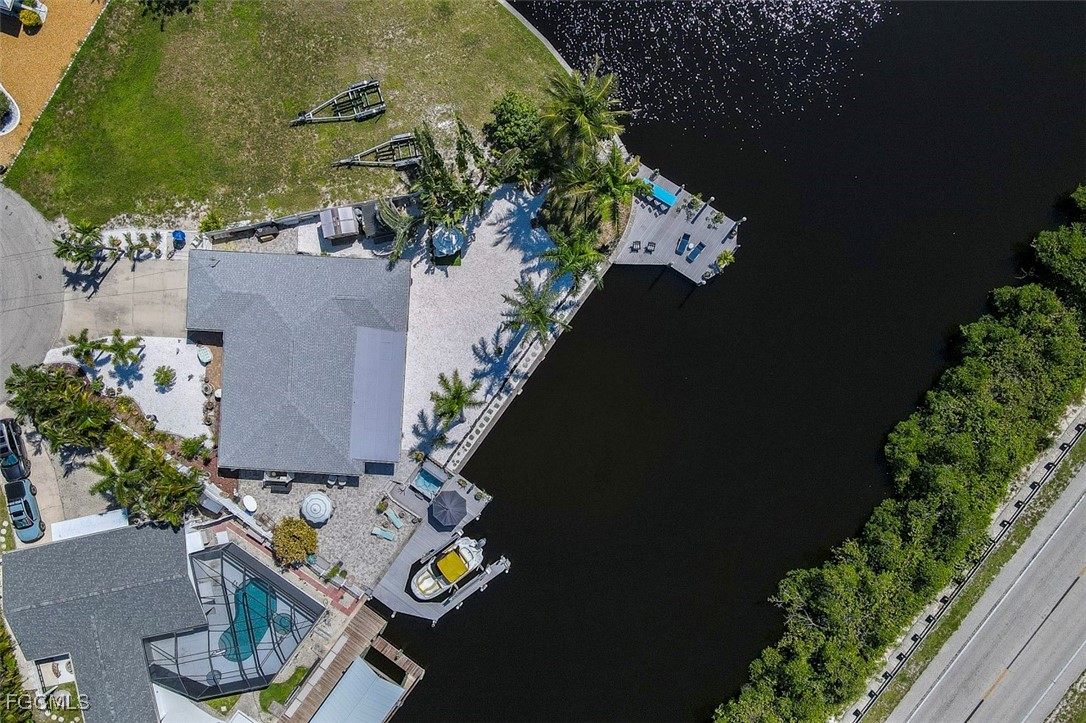 12082 Moon Shell Drive Matlacha Isles, FL 33991 - Photo 40 of 46 an aerial view of house with yard