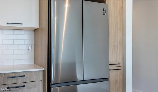 a view of kitchen with wooden floor