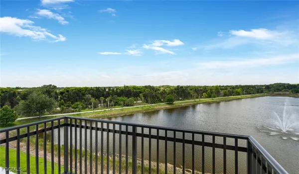 a view of a lake from a balcony