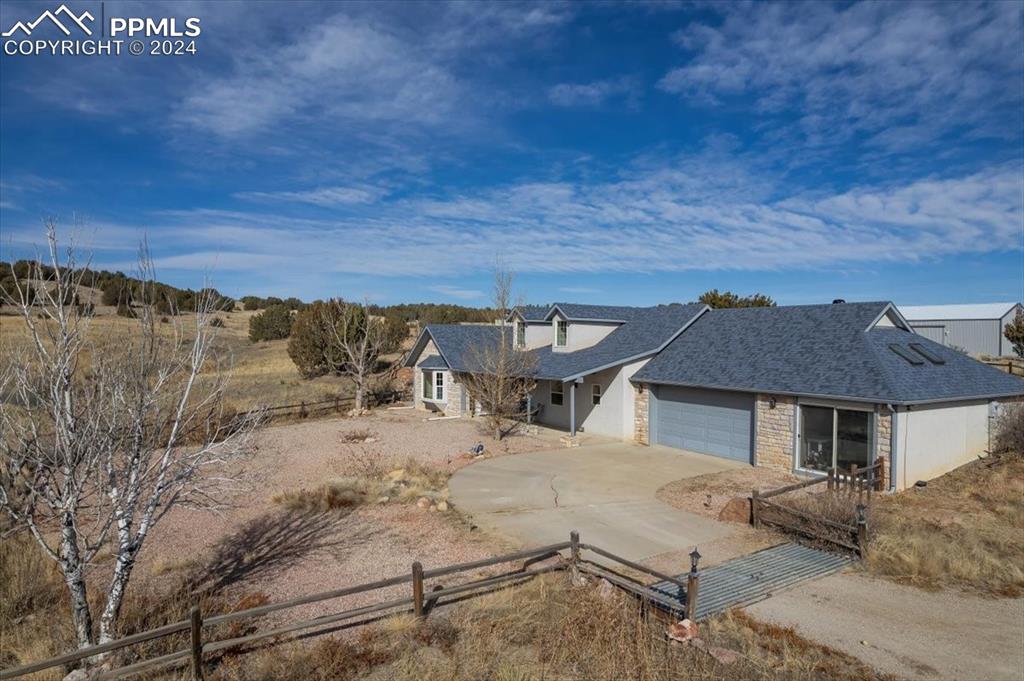 6670 Zercher Road Beulah, CO 81023 - Photo 11 of 37 a view of a house with pool table and chairs