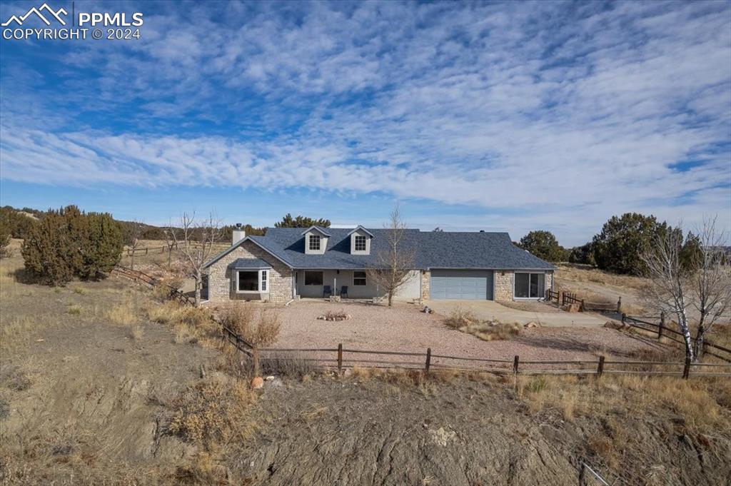 6670 Zercher Road Beulah, CO 81023 - Photo 12 of 37 a view of a big house with a big yard and large tree