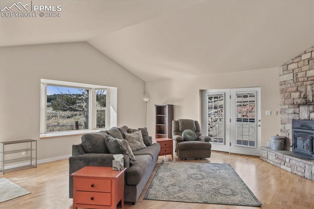 6670 Zercher Road Beulah, CO 81023 - Photo 16 of 37 a living room with furniture and a fireplace