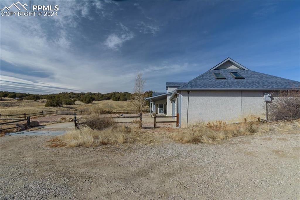 6670 Zercher Road Beulah, CO 81023 - Photo 35 of 37 a view of a dry yard with wooden fence