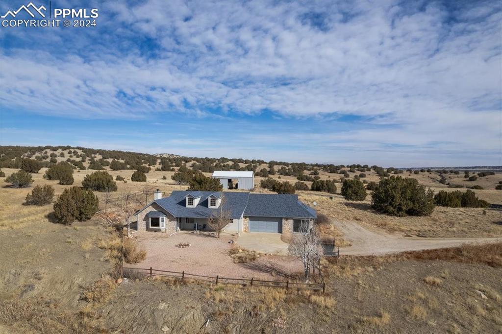 6670 Zercher Road Beulah, CO 81023 - Photo 4 of 37 an aerial view of a house with a yard