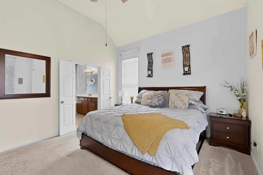 4004 White Porch Road Plano, TX 75024 - Photo 21 of 40 a bedroom with a bed and closet
