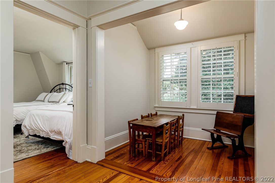 205 Cherokee Road Pinehurst, NC 28374 - Photo 39 of 39 a bedroom with furniture and a window