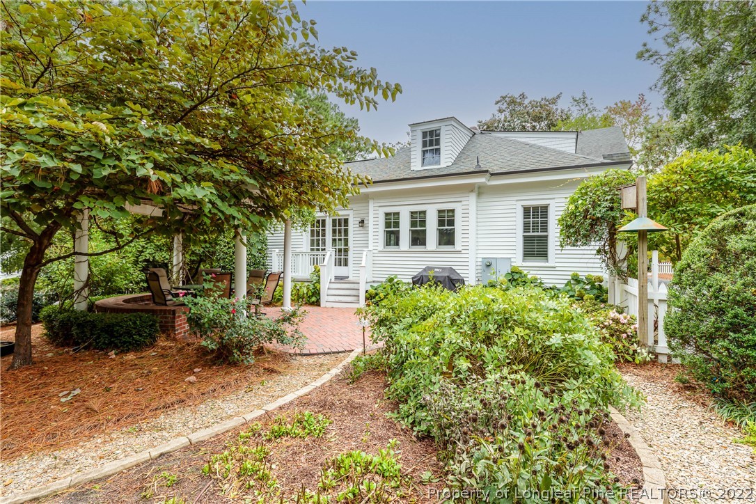 205 Cherokee Road Pinehurst, NC 28374 - Photo 4 of 39 front view of a house with a yard