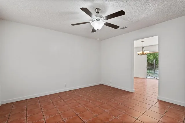 a kitchen with granite countertop a sink stainless steel appliances and cabinets