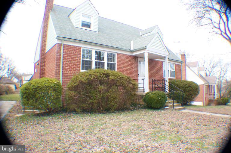 3710 Kayson Street Silver Spring, MD 20906 - Photo 11 of 24 a view of a house with a yard
