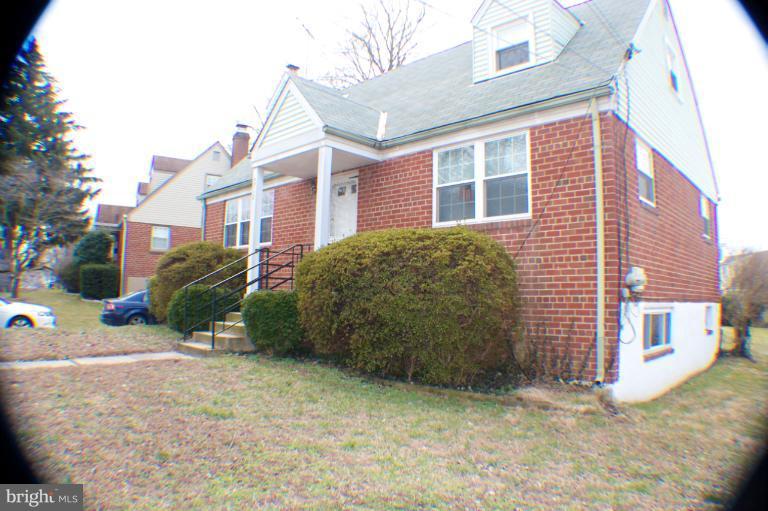 3710 Kayson Street Silver Spring, MD 20906 - Photo 16 of 24 a view of a house with a yard