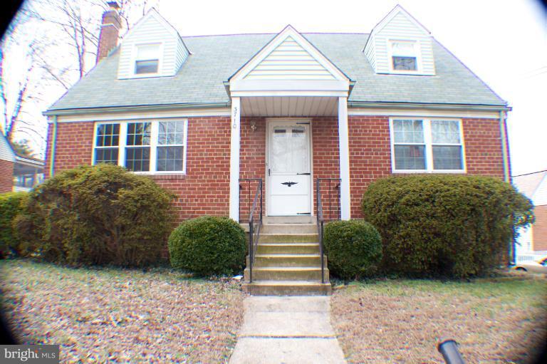 3710 Kayson Street Silver Spring, MD 20906 - Photo 24 of 24 a view of a house with wooden fence and a large windows